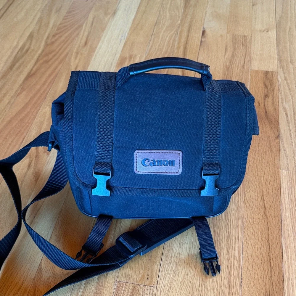 Canon Black Camera Bag with Top Handle and Shoulder Strap